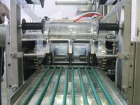 K balícím strojům vám dodáme vám také příslušenství v podobě navíjení odpadní fólie